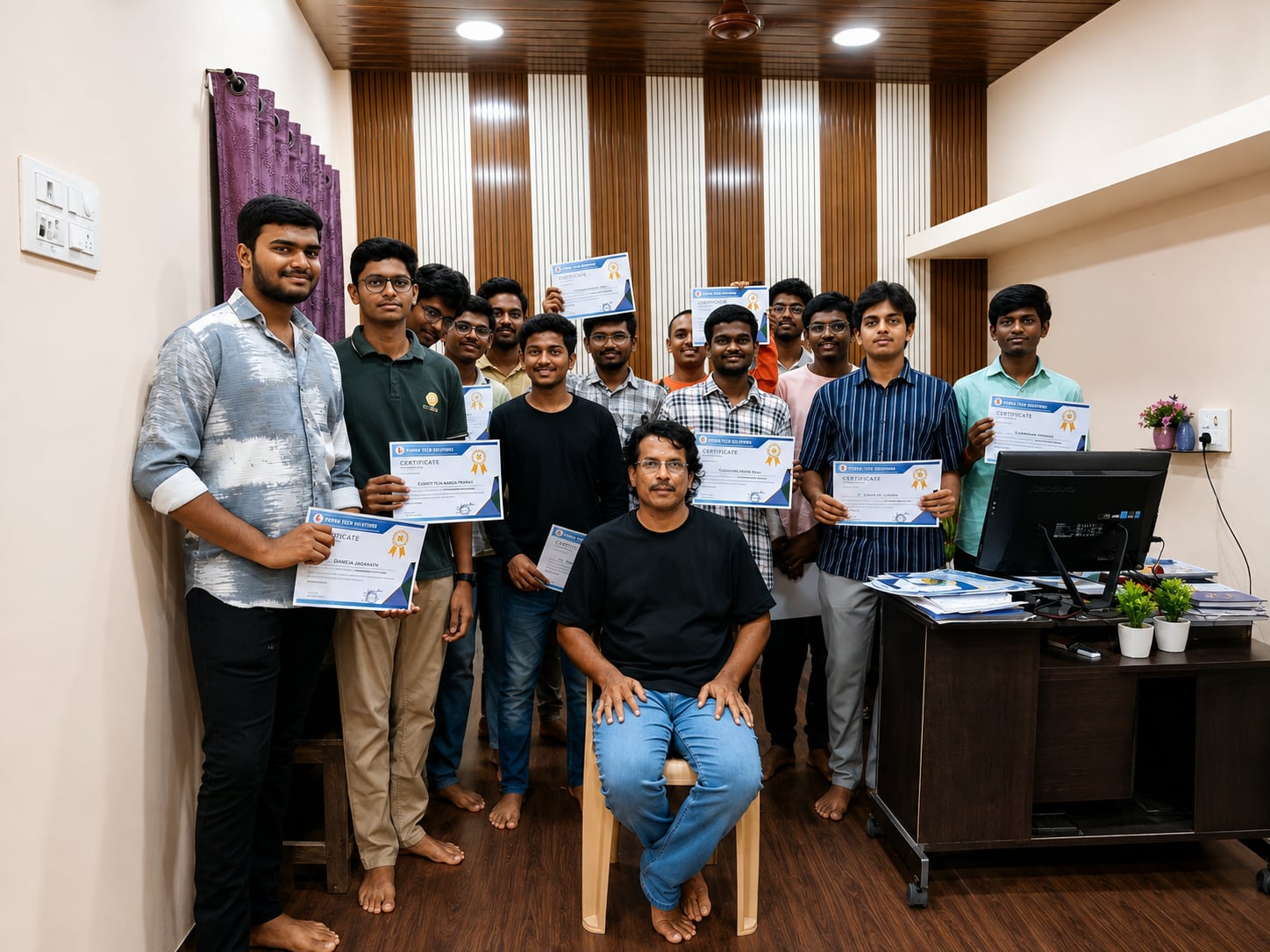 Graduating students holding their course certificates